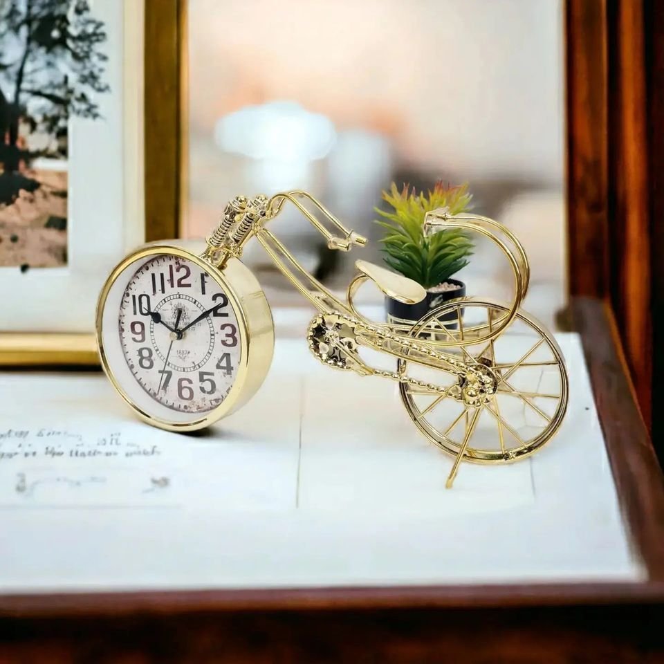 345211951_550740130307811_5053565903114253543_n.jpg Golden Cycle Table Clock - Image 1