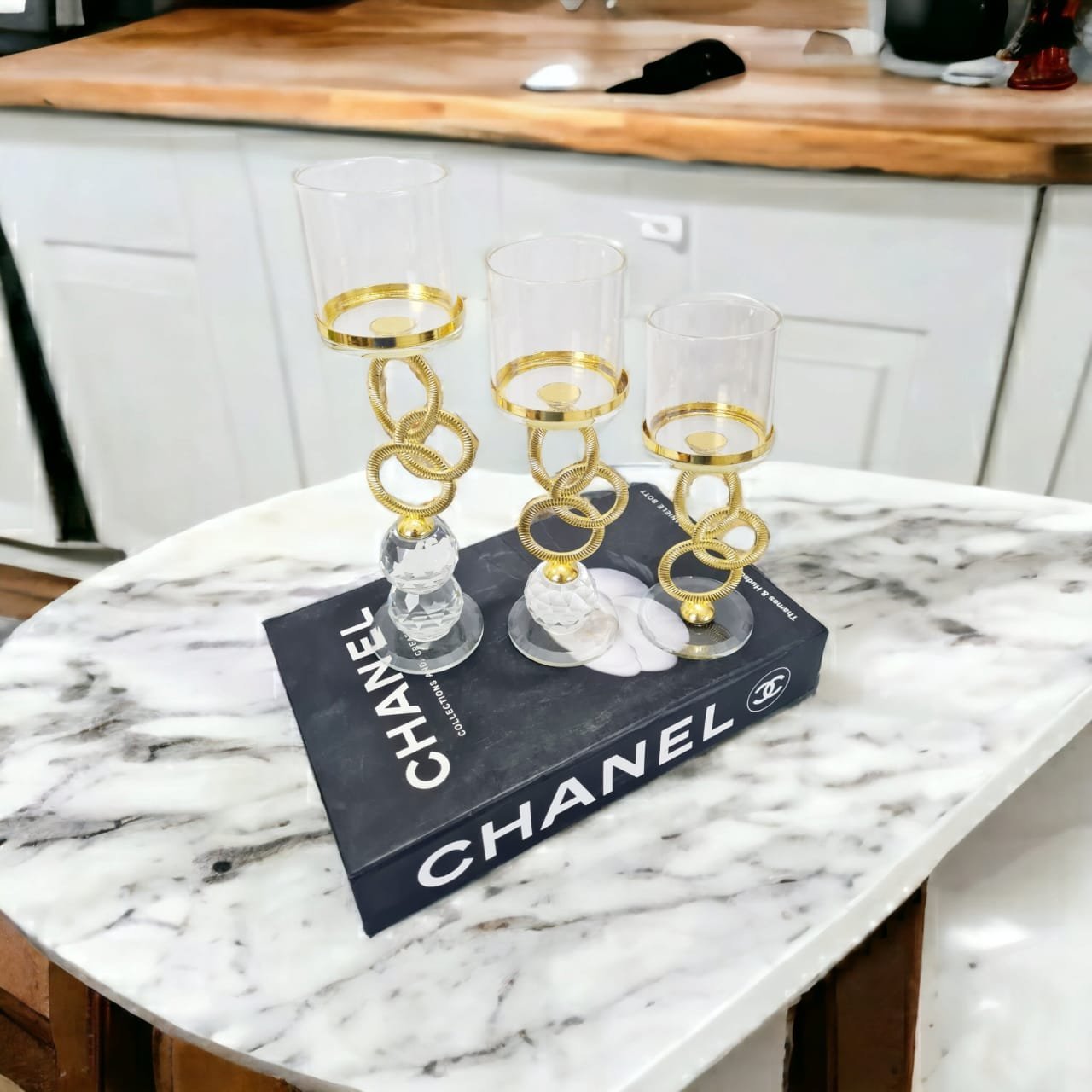 Metal_and_glass_ball_candle_stand_1.jpeg Metal Ring Crystal Ball Candle Stand - L - Image 1